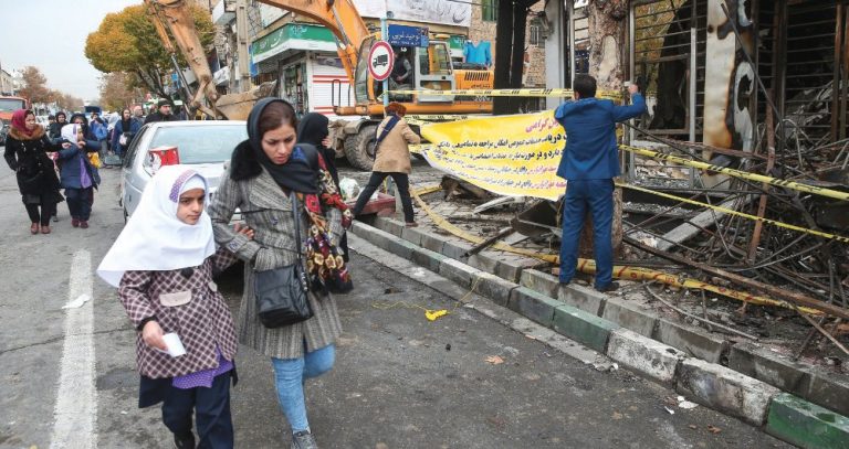 One year on, grief and anger over Iran protest crackdown