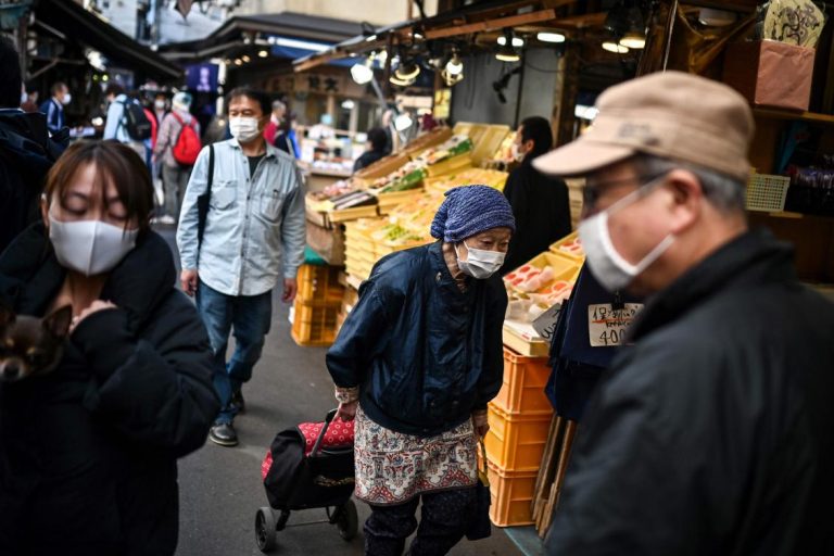 Coronavirus cases in Japan hit record amid holiday travel