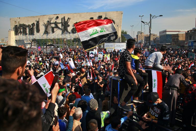Three dead as rival protesters clash in southern Iraq