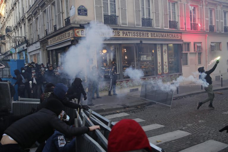 Police fire tear gas at Paris protest against police violence