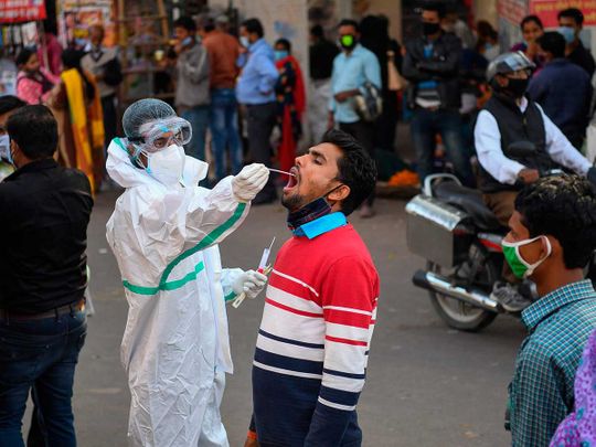 Delhi plans COVID-19 curbs as infections rise, critical-care beds run short