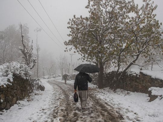 Photos: Season’s first snowfall covers Kashmir