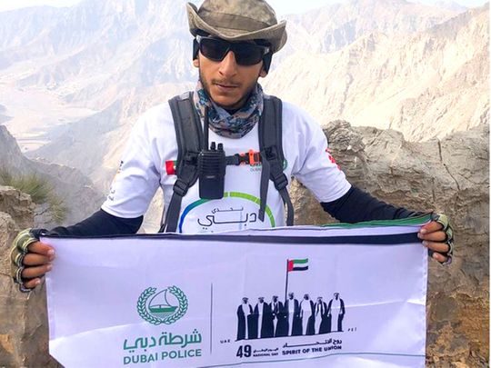 UAE National Day 2020: Dubai Policeman raises ‘Spirit of the Union’ banner on Ras Al Khaimah’s Jebel Jais