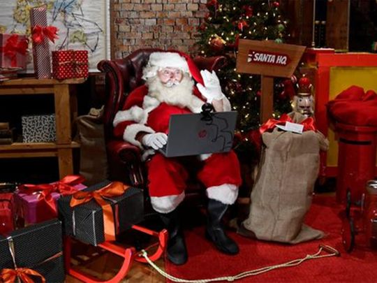 Photos: Santa Claus maintains social distance amid COVID-19