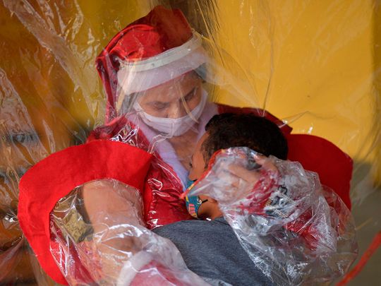 COVID-19, cancer can’t stop Mrs Santa Claus in Brazil