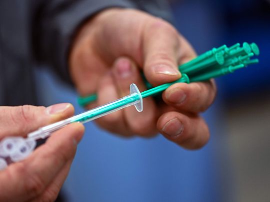 Photos: German factory races to churn out COVID-19 syringes