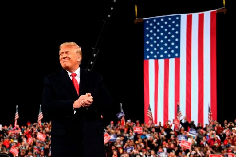 Trump falsely claims he won Georgia as he stumps for two Republican candidates