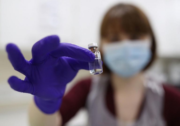 WHO warns virus crisis not over as vaccine rollout starts