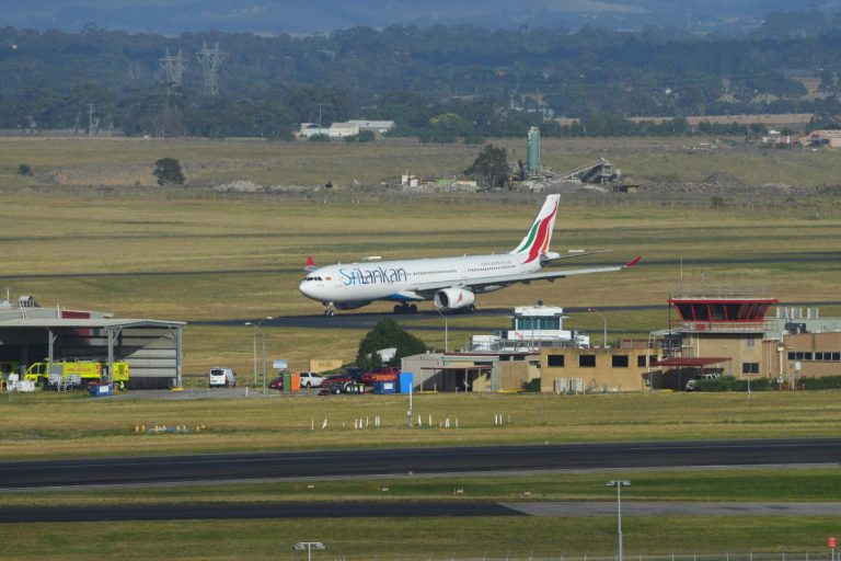 Melbourne welcomes first international flight in 5 months as coronavirus curbs ease