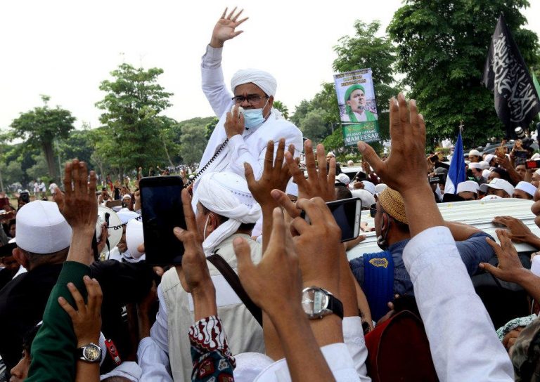 Hard-line Indonesian cleric held on suspicion he broke coronavirus restrictions