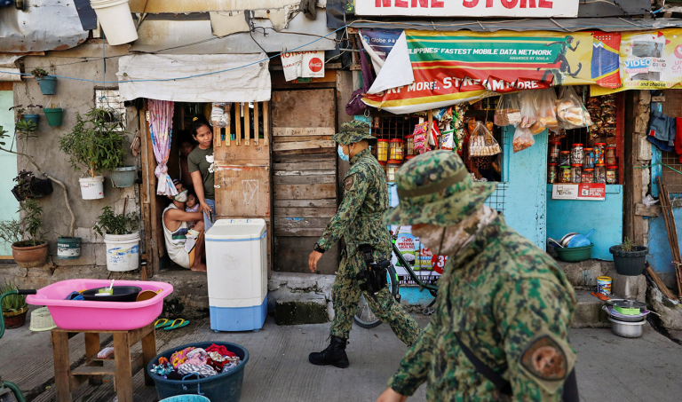 Execution-style killing of mother and son by off-duty policeman sparks outrage in the Philippines