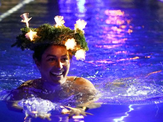 Photos: Estonians plunge into icy water to ward off coronavirus blues