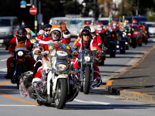 Photos: Santa Claus bikers parade in Tokyo against child abuse