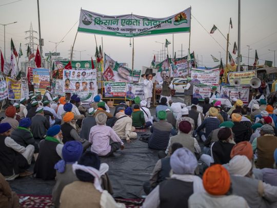Why are Indian farmers protesting, and what can Modi do?