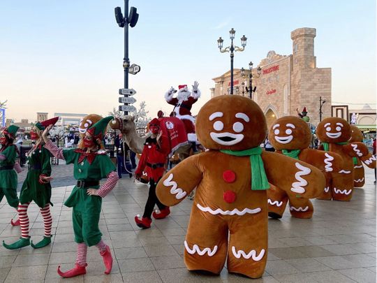 UAE residents enjoy a festive Christmas Eve with bright lights and delicious food