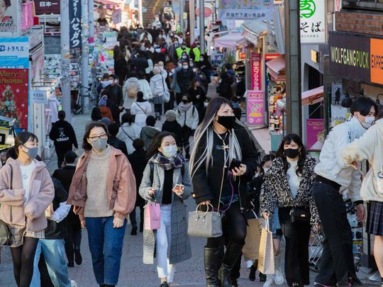 Tokyo says COVID-19 strain on hospitals is severe, raises alert to highest