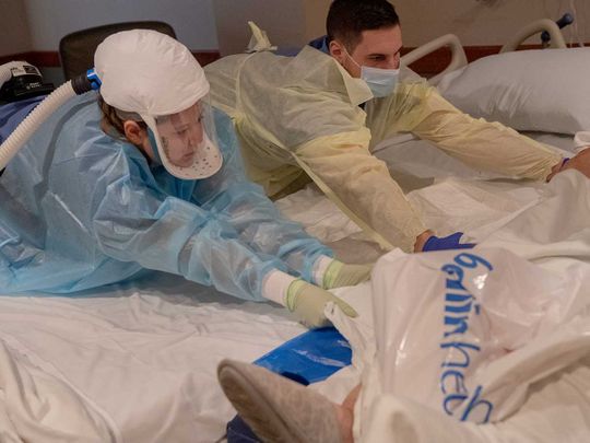 As hospitals fill in US, travel nurses race to COVID-19 hot spots