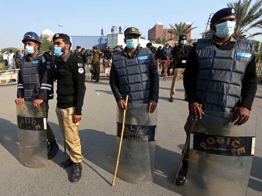 Pakistan government warns of action against opposition defying COVID-19 rules