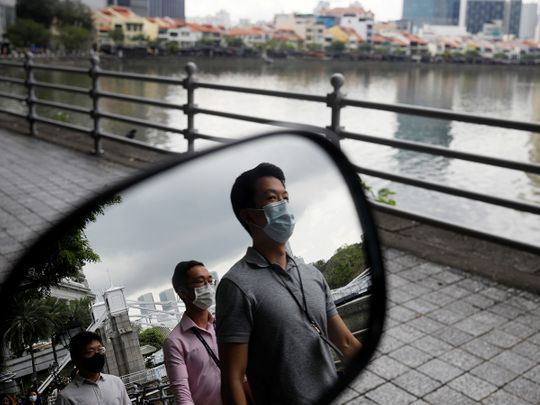 Singapore approves Pfizer’s COVID-19 vaccine in Asia first