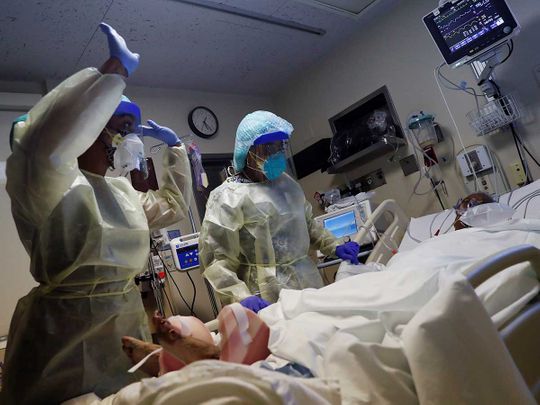 US panel: First COVID-19 vaccines to health care workers, nursing home
