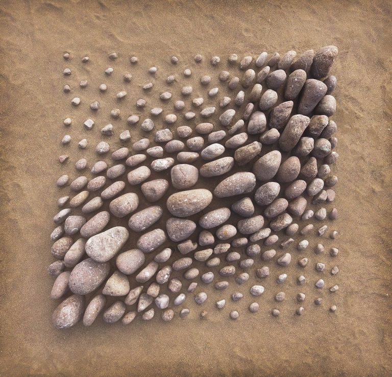 Precisely Arranged Stones Coil and Surge Across the Land in Jon Foreman’s Mesmeric Works