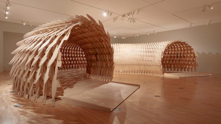 A Curved Pavilion Designed by Kengo Kuma Weaves Wooden Slats into a Tessellating Structure