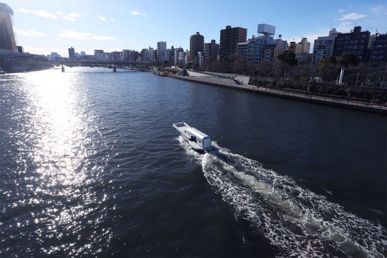An Oversized Zipper Ship Opens the Sumida River Flowing Through Tokyo