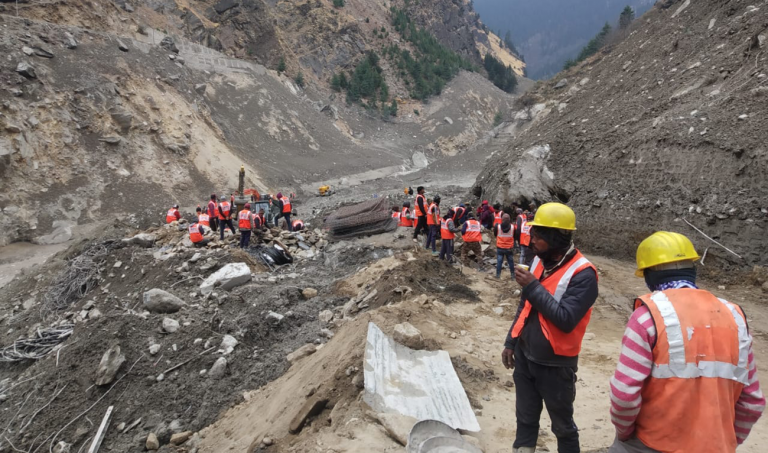 Indian village clings to hope after dam burst kills 32