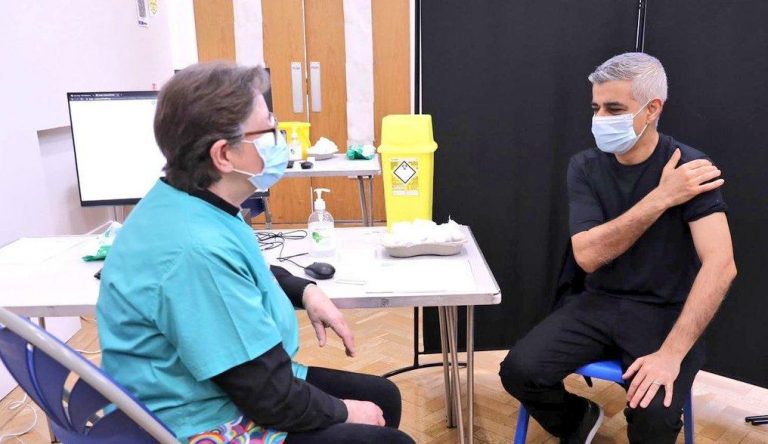 London mayor takes COVID-19 vaccine, urges UK minorities to follow suit