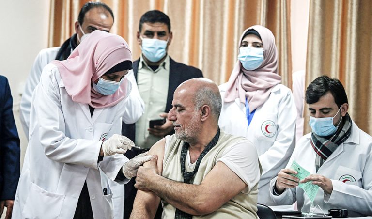 Gaza launches COVID-19 vaccinations, with just 22,000 doses