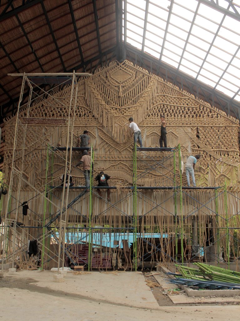 A Trio of Monumental Macramé Installations Stretch 37 Feet Across a Seaside Structure in Bali