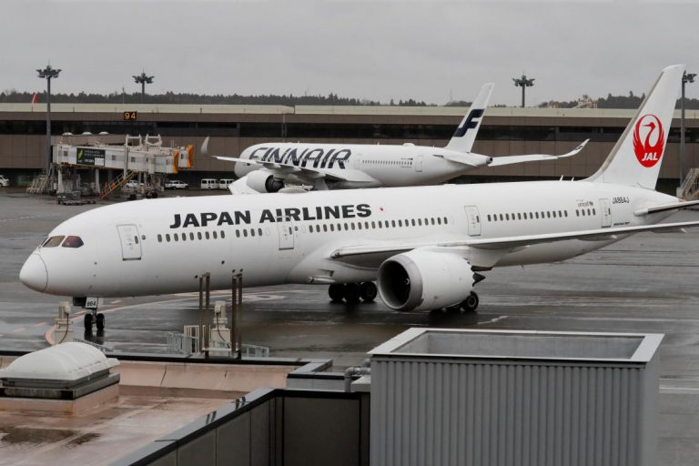 Men accused of aiding Ghosn escape arrive in Japan after extradition