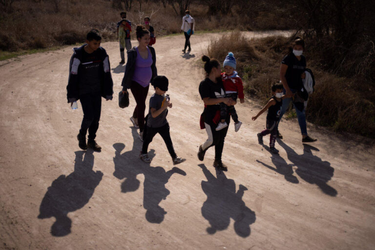 US detained nearly 100,000 migrants at Mexico border in February, sources say