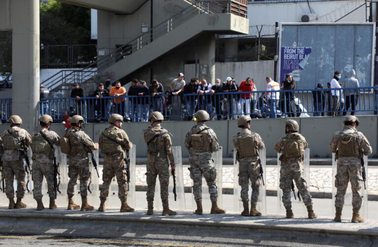 Lebanese army starts clearing roadblocks after week of protests