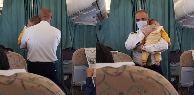 Pakistani flight attendant becomes online hero for soothing crying baby