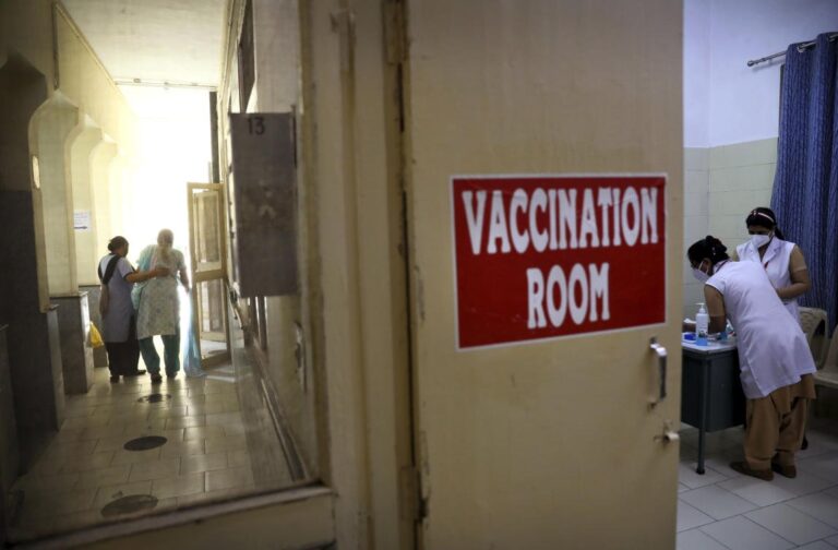 India fights coronavirus surge, steps up jabs amid export row