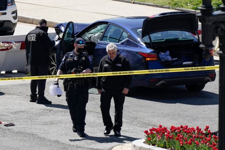 Car rams US Capitol barricade, killing 1 officer, injuring another; suspect shot dead