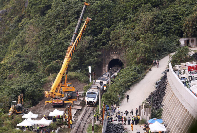 Taiwan prosecutors probe train crash that killed 50
