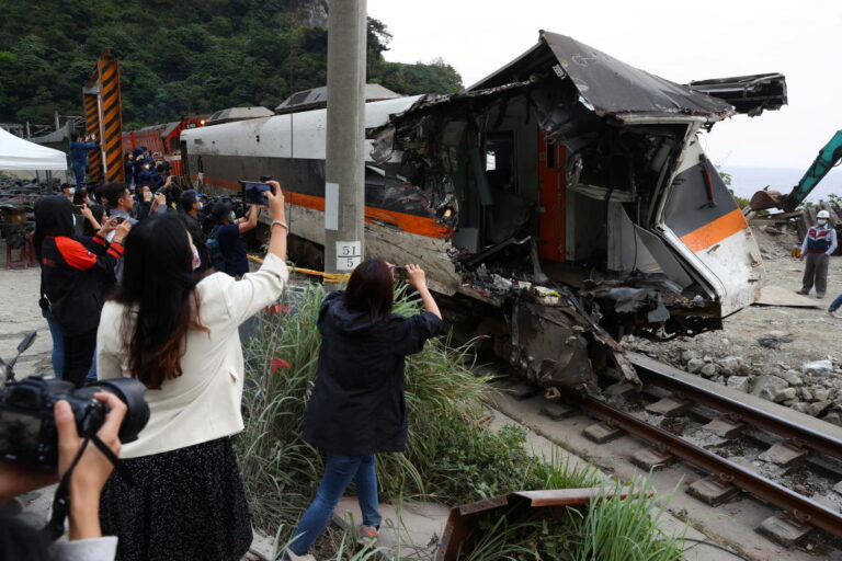 Workers clear last train from deadly crash site in Taiwan