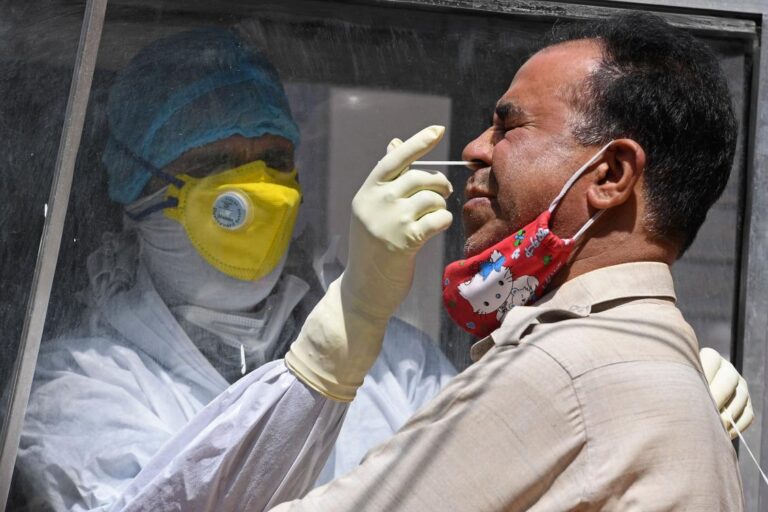 India’s new COVID-19 infections hit record, deaths at over five-month high
