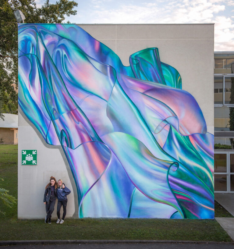 Trompe L’oeil Textiles Billow Across Murals by Rosie Woods in Iridescent Ripples