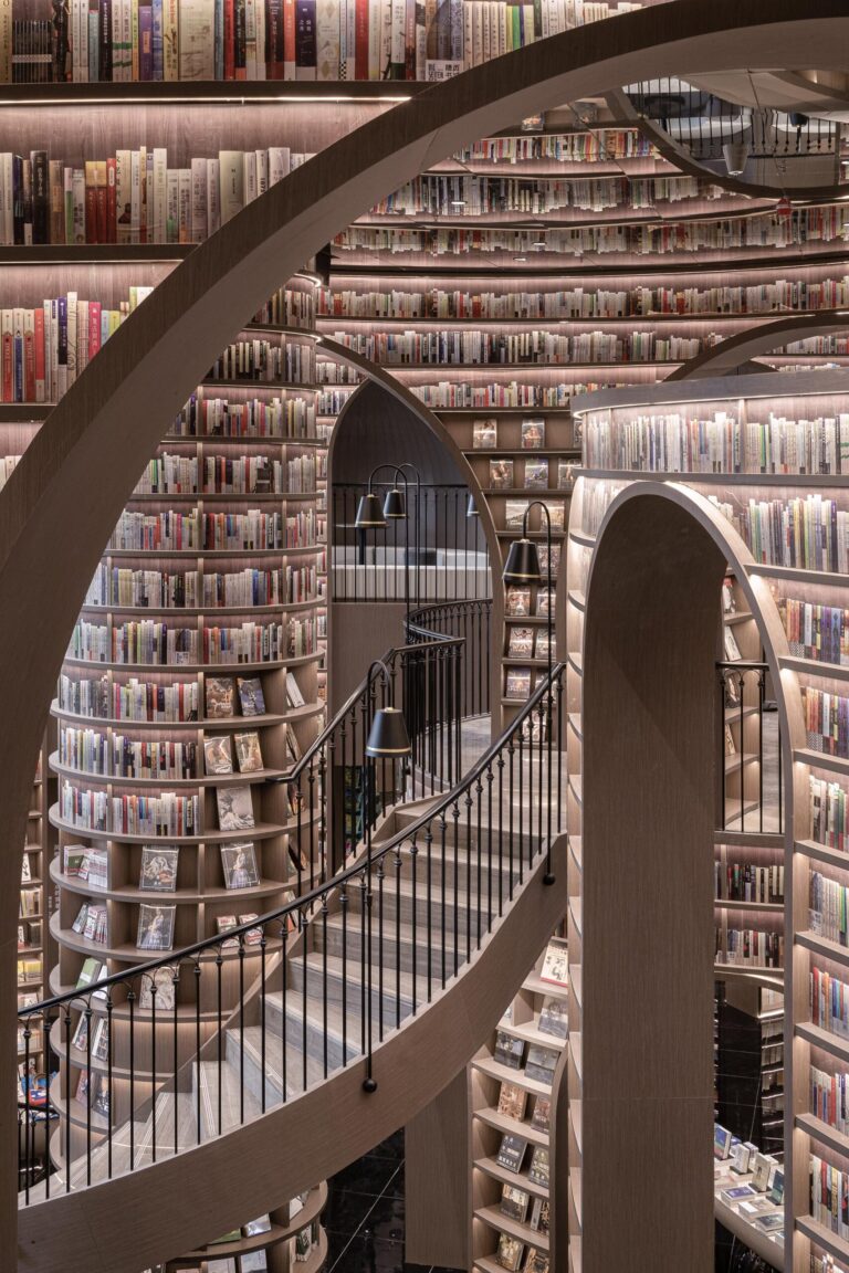 A Mirrored Ceiling and Gleaming Tile Floor Turn This Chinese Bookstore into an Immersive M.C. Escher-Style Illusion