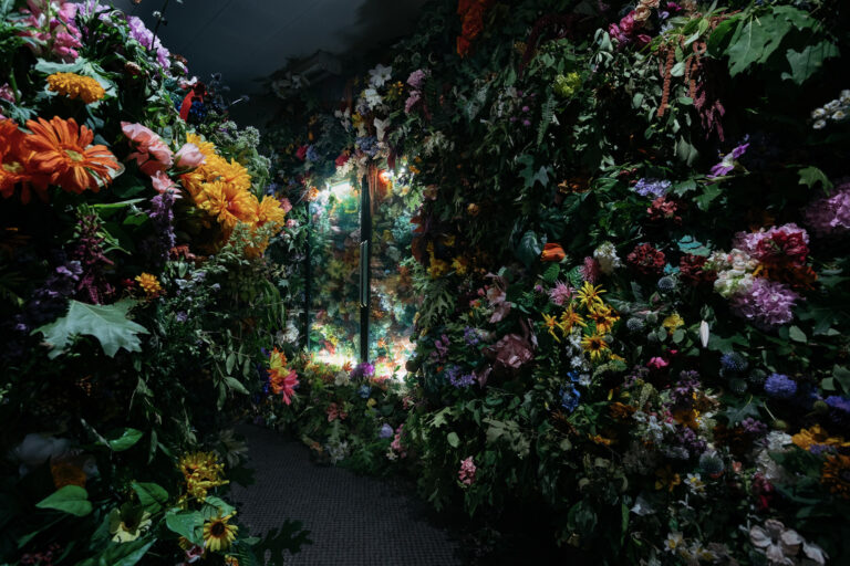 Thousands of Fresh and Artificial Flowers Overrun an Abandoned Convenience Store in a Small Michigan Town