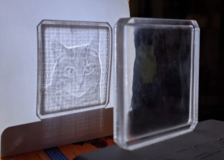 An Engineer Creates Images Hidden Inside Translucent Windows Exposed Only by Light