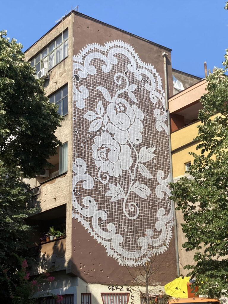 Ornate Murals by Nespoon Cloak Blank Facades in Traditional Lace Patterns