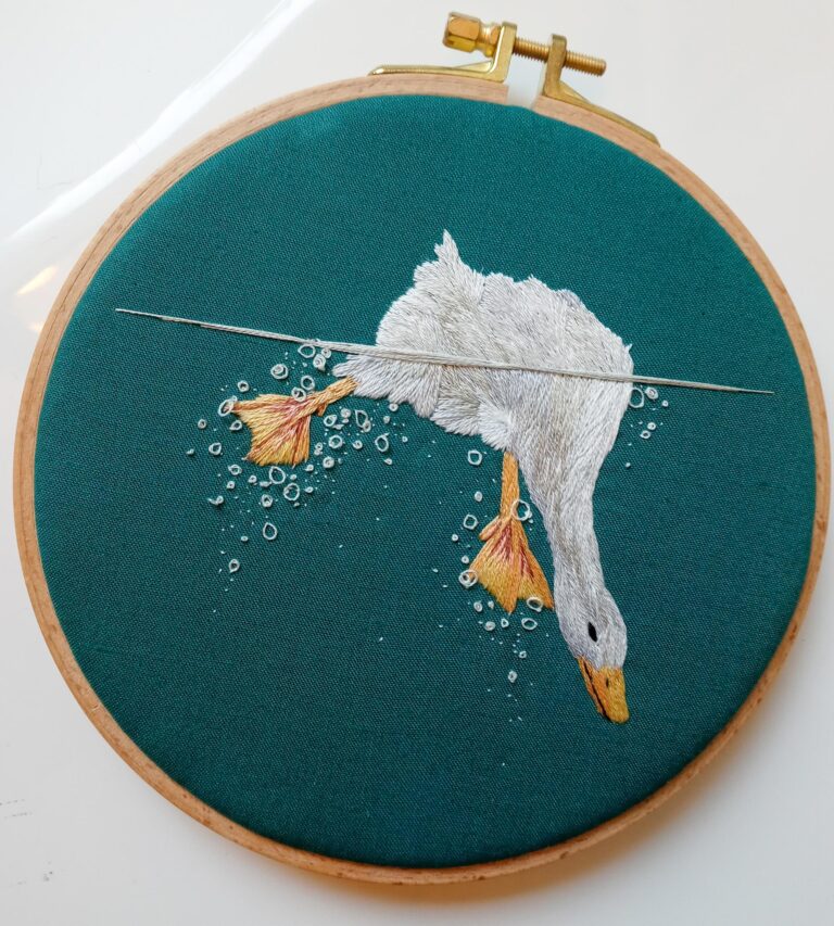 Ducks, Otters, and Other Wildlife Plunge into Water in Intricate Split-View Embroideries