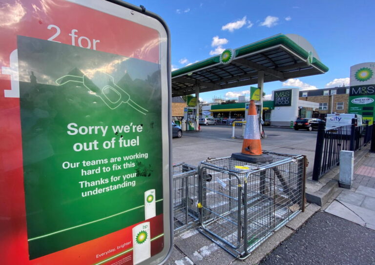 Britain puts military on standby as panic buying leaves pumps dry