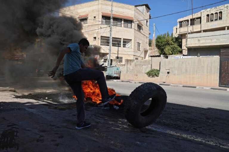 Two Palestinians wounded in raids by Israeli troops