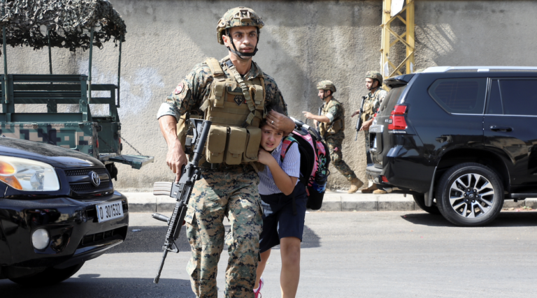 Lebanon president says people behind violence will be held accountable, PM announces day of mourning