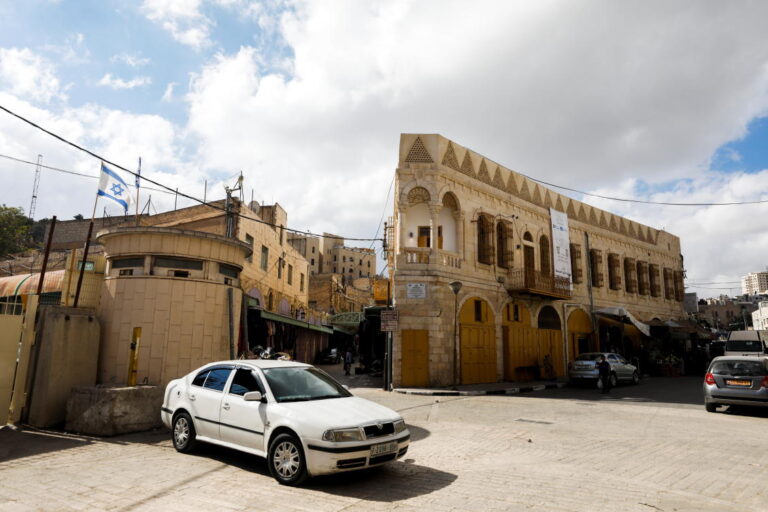 Israelis in West Bank flashpoint dig for new neighborhood